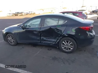 2015 Mazda 3 i Grand Touring with VIN JM1BM1W71F1226283, listed as a IAAI auction lot 41450177 with 136,621 mi miles and . Bid and sale history available at DreamBid. Image 14.