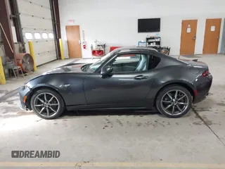 2021 Mazda MX-5 Miata Grand Touring with VIN JM1NDAM73M0451484, listed as a IAAI auction lot 41485044 with 11,328 mi miles and . Bid and sale history available at DreamBid. Image 14.