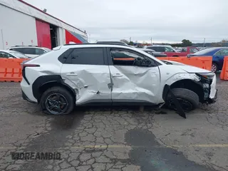2024 Subaru Solterra Limited z VIN JTMABABA9RA056018, wystawiony jako IAAI lot #41611126 z przebiegiem 15 861 mil mil oraz . Historia ofert i sprzedaży dostępna na DreamBid. Obrazek 13.