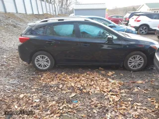 2017 Subaru Impreza Premium with VIN 4S3GTAB69H3704625, listed as a IAAI auction lot 41864611 with 71,352 mi miles. Bid and sale history available at carsss.com. Image 14.