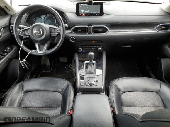 2021 Mazda CX-5 Grand Touring with VIN JM3KFBDM7M1122281, listed as a Copart auction lot 54576485 with 93,008 mi miles and Salvage Title. Bid and sale history available at DreamBid. Image 8.