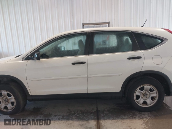 2015 Honda CR-V LX with VIN 5J6RM4H36FL005268, listed as a IAAI auction lot 42101431 with 179,411 mi miles and . Bid and sale history available at DreamBid. Image 13.