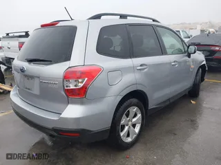 2015 Subaru Forester 2.5i Premium with VIN JF2SJADC2FH830877, listed as a IAAI auction lot 41594954 with 128,984 mi miles. Bid and sale history available at carsss.com. Image 4.