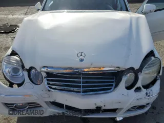 2007 Mercedes-Benz E-Class 3.5L with VIN WDBUF56X47B084760, listed as a Copart auction lot 84942024 with 117,213 mi miles and Salvage Title. Bid and sale history available at carsss.com. Image 12.