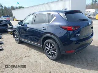 2018 Mazda CX-5 Touring z VIN JM3KFBCM4J0379871, wystawiony jako IAAI lot #41865130 z przebiegiem 48 674 mil mil oraz . Historia ofert i sprzedaży dostępna na DreamBid. Obrazek 3.