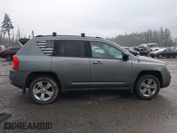 2013 Jeep Compass Sport with VIN 1C4NJDBB5DD101879, listed as a IAAI auction lot 41208112 with 168,300 mi miles. Bid and sale history available at carsss.com. Image 13.