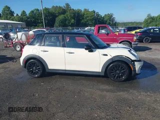 2019 MINI Hardtop 4 Door Cooper with VIN WMWXU1C5XK2J02832, listed as a IAAI auction lot 42525235 with 68,296 mi miles and . Bid and sale history available at DreamBid. Image 13.
