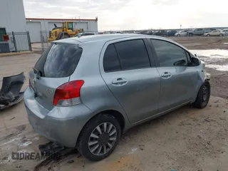 2010 Toyota Yaris with VIN JTDKT4K33A5314776, listed as a IAAI auction lot 41570383 with 167,428 mi miles. Bid and sale history available at carsss.com. Image 4.