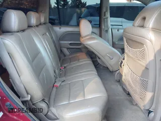 2006 Honda Pilot EX-L with VIN 5FNYF28586B005602, listed as a IAAI auction lot 41247326 with 221,698 mi miles and . Bid and sale history available at DreamBid. Image 8.