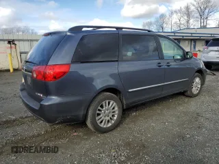 2010 Toyota Sienna XLE with VIN 5TDDK4CC0AS032292, listed as a Copart auction lot 48085825 with 127,599 mi miles and Clean title. Bid and sale history available at DreamBid. Image 3.