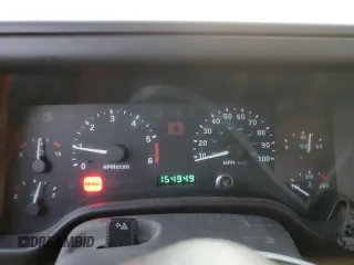 2000 Jeep Wrangler Sport with VIN 1J4FA49S1YP748529, listed as a Copart auction lot 77041924 with 154,949 mi miles and Salvage Title. Bid and sale history available at carsss.com. Image 9.