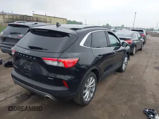 2021 Ford Escape Titanium Hybrid with VIN 1FMCU9DZ5MUA18079, listed as a IAAI auction lot 42340093 with 71,630 mi miles and . Bid and sale history available at DreamBid. Image 4.