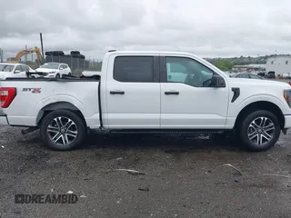 2023 Ford F-150 XL with VIN 1FTEW1EP5PFB87582, listed as a IAAI auction lot 42254015 with 10,476 mi miles and . Bid and sale history available at DreamBid. Image 13.
