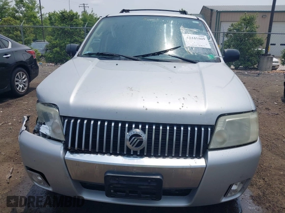 2005 Mercury Mariner Luxury z VIN 4M2CU57135DJ23718, wystawiony jako IAAI lot #42441869 z przebiegiem 179 378 mil mil oraz . Historia ofert i sprzedaży dostępna na DreamBid. Obrazek 12.