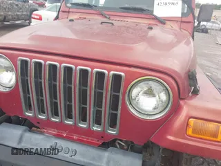 2000 Jeep Wrangler Sport with VIN 1J4FA49S2YP764321, listed as a IAAI auction lot 42385965 with Not provided miles and . Bid and sale history available at DreamBid. Image 6.