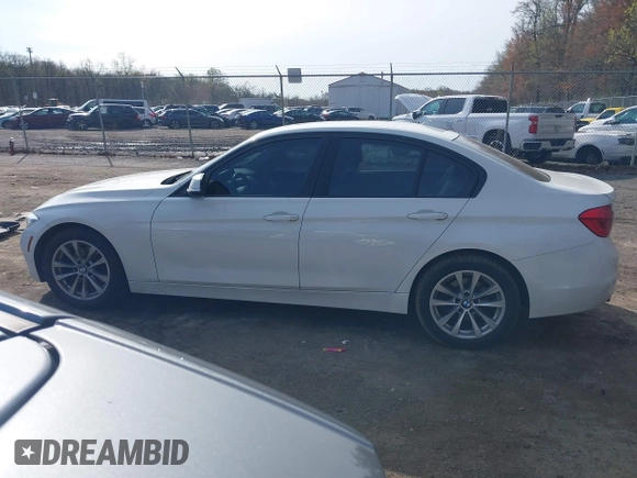 2018 BMW 3 Series 320i xDrive with VIN WBA8E5G53JNV03347, listed as a IAAI auction lot 41908985 with 122,111 mi miles. Bid and sale history available at carsss.com. Image 14.