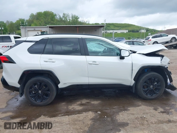 2024 Toyota RAV4 Hybrid SE with VIN 2T3T6RFV3RW066117, listed as a IAAI auction lot 42198742 with 12,352 mi miles and . Bid and sale history available at DreamBid. Image 14.
