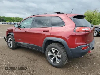 2014 Jeep Cherokee Trailhawk z VIN 1C4PJMBS2EW130125, wystawiony jako Copart lot #57830635 z przebiegiem 117 811 mil mil oraz Szkody całkowita. Historia ofert i sprzedaży dostępna na DreamBid. Obrazek 2.