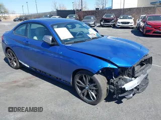 2015 BMW 2 Series M235i with VIN WBA1J7C59FV254140, listed as a IAAI auction lot 41642427 with 23,957 mi miles and . Bid and sale history available at carsss.com. Image 1.
