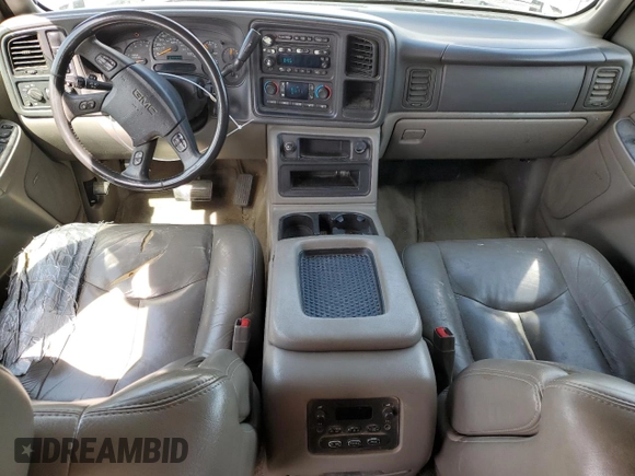 2005 GMC Yukon XL SLT z VIN 1GKFK16Z25J170446, wystawiony jako Copart lot #60833165 z przebiegiem 255 497 mil mil oraz Czysty tytuł • Clean title. Historia ofert i sprzedaży dostępna na DreamBid. Obrazek 8.