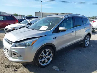 2016 Ford Escape Titanium with VIN 1FMCU0J94GUB11776, listed as a IAAI auction lot 41945655 with 119,949 mi miles. Bid and sale history available at carsss.com. Image 2.