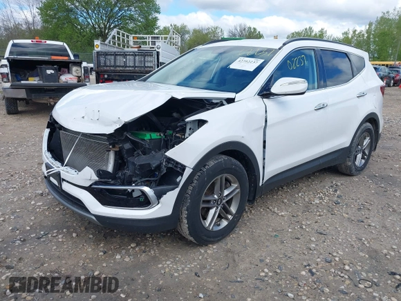 2018 Hyundai Santa Fe 2.4L z VIN 5NMZUDLB1JH101842, wystawiony jako IAAI lot #42302237 z przebiegiem 97 376 mil mil oraz . Historia ofert i sprzedaży dostępna na DreamBid. Obrazek 2.