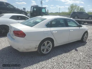 2015 Volkswagen Passat 2.0L TDI SE w/Sunroof with VIN 1VWBV7A32FC093846, listed as a Copart auction lot 52032715 with 124,434 mi miles and Salvage Title. Bid and sale history available at carsss.com. Image 3.