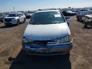 2002 Toyota Sienna LE with VIN 4T3ZF13C62U444564, listed as a IAAI auction lot 41515466 with 284,745 mi miles. Bid and sale history available at carsss.com. Image 13.