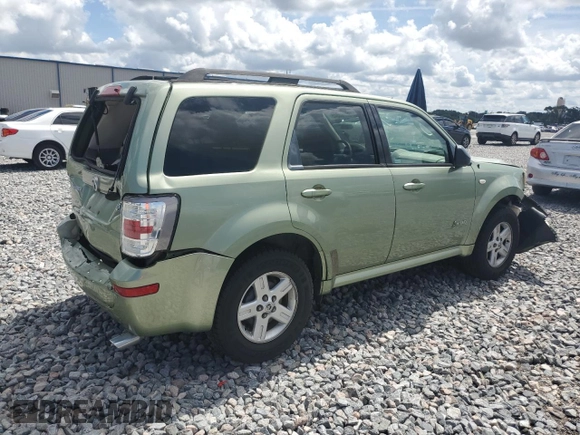 2009 Mercury Mariner Hybrid with VIN 4M2CU29399KJ17064, listed as a Copart auction lot 60263545 with 176,232 mi miles and Salvage title. Bid and sale history available at DreamBid. Image 3.