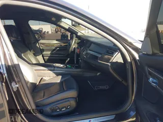 2015 BMW 7 Series 750Li with VIN WBAYE8C52FD780902, listed as a IAAI auction lot 40808265 with 102,774 mi miles. Bid and sale history available at carsss.com. Image 5.