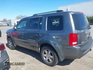 2010 Honda Pilot Touring with VIN 5FNYF4H94AB031167, listed as a IAAI auction lot 41800738 with 184,126 mi miles and . Bid and sale history available at carsss.com. Image 14.
