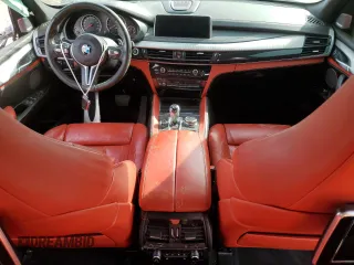 2015 BMW X5 M z VIN 5YMKT6C55F0C89017, wystawiony jako Copart lot #49052065 z przebiegiem 125 287 mil mil oraz Tytuł czysty. Historia ofert i sprzedaży dostępna na DreamBid. Obrazek 8.