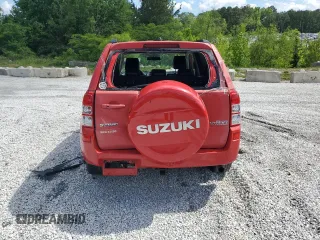 2006 Suzuki Grand Vitara Luxury z VIN JS3TE947164104266, wystawiony jako Copart lot #56154905 z przebiegiem 185 195 mil mil oraz Szkoda całkowita • Salvage title. Historia ofert i sprzedaży dostępna na DreamBid. Obrazek 6.
