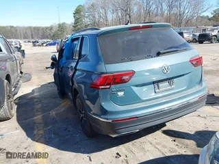 2021 Volkswagen Tiguan SE with VIN 3VV3B7AX1MM023903, listed as a IAAI auction lot 41712233 with 1 mi miles. Bid and sale history available at carsss.com. Image 3.