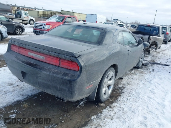 2012 Dodge Challenger SXT Plus z VIN 2C3CDYAG6CH106193, wystawiony jako IAAI lot #41641118 z przebiegiem 65 602 mil mil oraz . Historia ofert i sprzedaży dostępna na DreamBid. Obrazek 4.