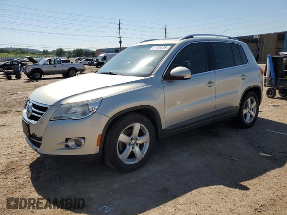 2010 Volkswagen Tiguan S с VIN WVGBV7AXXAW520599, выставлен на аукционе Copart как лот 62006315 с пробегом 143 877 миль миль и Чистый • Clean title. История ставок и продаж доступна на DreamBid. Изображение 1.