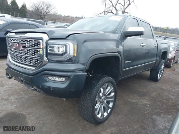 2018 GMC Sierra 1500 Denali with VIN 3GTU2PEJ8JG571593, listed as a IAAI auction lot 41169420 with 98,501 mi miles. Bid and sale history available at carsss.com. Image 2.