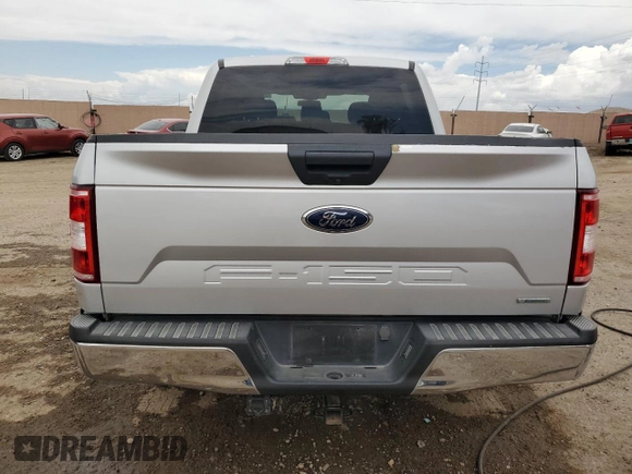 2018 Ford F-150 XL with VIN 1FTEW1CG5JKE45696, listed as a Copart auction lot 59895825 with 79,887 mi miles and Salvage title. Bid and sale history available at DreamBid. Image 6.