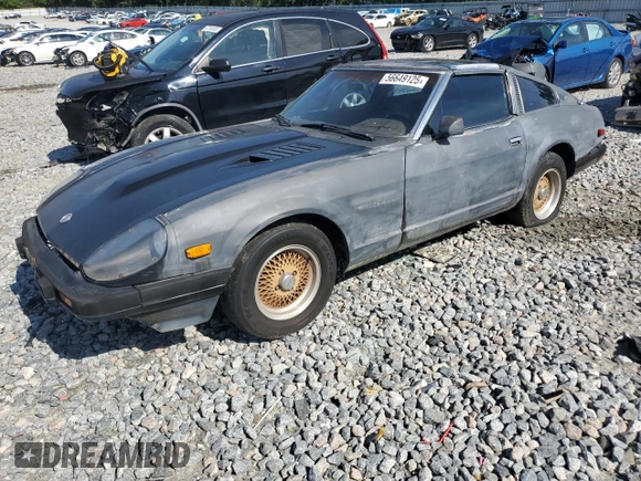 1982 Datsun 280ZX z VIN JN1HZ04S1CX447813, wystawiony jako Copart lot #56649125 z przebiegiem 285 290 mil mil oraz Tytuł czysty. Historia ofert i sprzedaży dostępna na DreamBid. Obrazek 1.