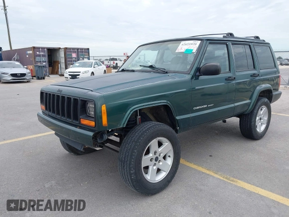 1999 Jeep Cherokee Sport z VIN 1J4FT68S1XL667138, wystawiony jako IAAI lot #42651020 z przebiegiem 200 324 mil mil oraz . Historia ofert i sprzedaży dostępna na DreamBid. Obrazek 2.