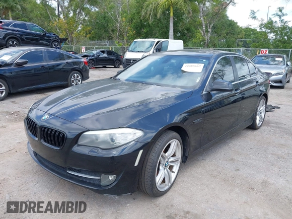 2011 BMW 5 Series 528i with VIN WBAFR1C58BC750449, listed as a IAAI auction lot 42083667 with 212,094 mi miles and . Bid and sale history available at carsss.com. Image 6.