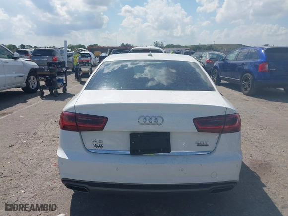 2016 Audi A6 3.0T Premium Plus with VIN WAUFGAFC9GN003664, listed as a IAAI auction lot 41890962 with 100,485 mi miles. Bid and sale history available at carsss.com. Image 16.