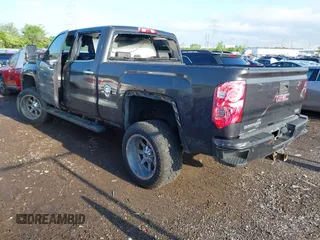 2015 GMC Sierra 2500HD SLT with VIN 1GT12ZE84FF553371, listed as a IAAI auction lot 42173249 with 247,703 mi miles and . Bid and sale history available at DreamBid. Image 3.