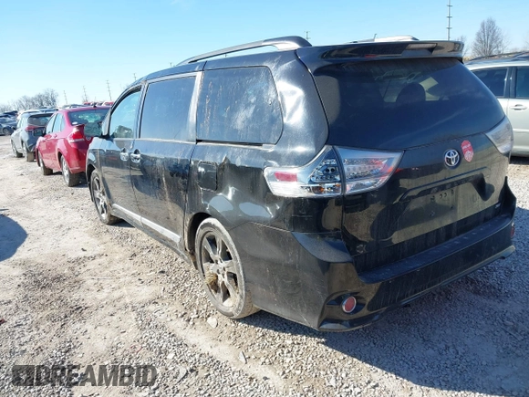 2014 Toyota Sienna SE with VIN 5TDXK3DC3ES521202, listed as a IAAI auction lot 41579320 with 182,982 mi miles and . Bid and sale history available at DreamBid. Image 3.