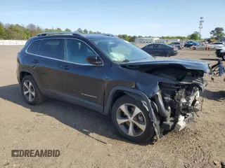 2020 Jeep Cherokee Limited with VIN 1C4PJMDXXLD643317, listed as a Copart auction lot 59341115 with 58,514 mi miles and Salvage title. Bid and sale history available at DreamBid. Image 4.