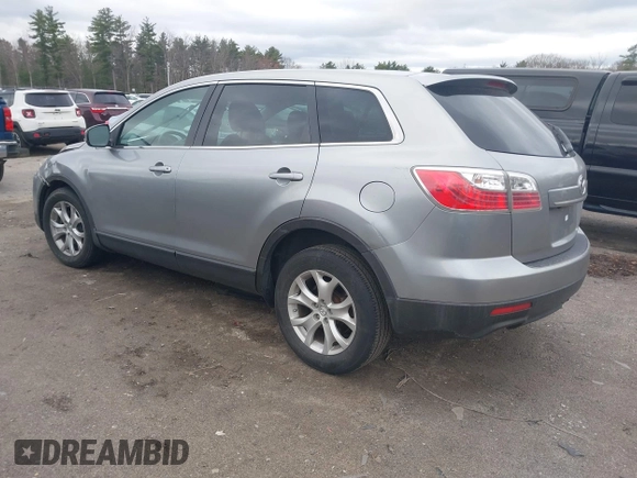 2011 Mazda CX-9 Touring z VIN JM3TB3CV7B0328316, wystawiony jako IAAI lot #42040999 z przebiegiem 160 421 mil mil oraz . Historia ofert i sprzedaży dostępna na DreamBid. Obrazek 3.