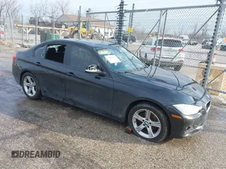 2014 BMW 3 Series 328i xDrive with VIN WBA3B3G58ENR83365, listed as a IAAI auction lot 41684711 with 141,669 mi miles. Bid and sale history available at carsss.com. Image 1.