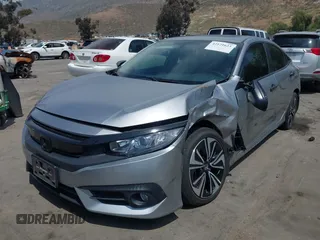 2018 Honda Civic EX-L z VIN JHMFC1F79JX037843, wystawiony jako IAAI lot #42121623 z przebiegiem 49 759 mil mil oraz . Historia ofert i sprzedaży dostępna na DreamBid. Obrazek 21.