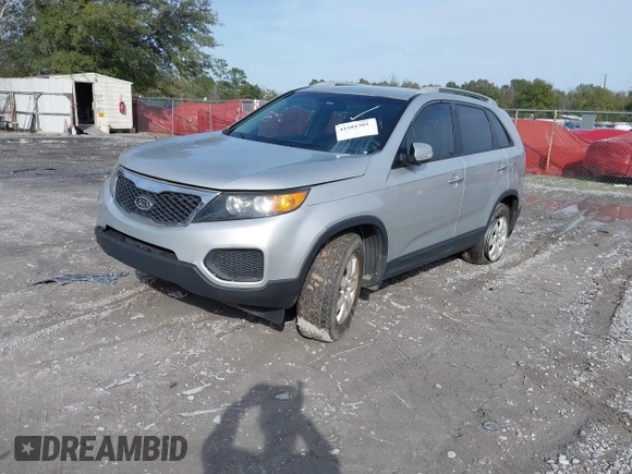 2013 Kia Sorento LX with VIN 5XYKT4A25DG389063, listed as a IAAI auction lot 41581301 with 167,726 mi miles. Bid and sale history available at carsss.com. Image 2.