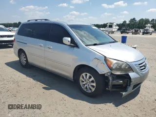 2010 Honda Odyssey EX with VIN 5FNRL3H47AB022393, listed as a Copart auction lot 61956845 with 317,023 mi miles and Salvage title. Bid and sale history available at DreamBid. Image 4.